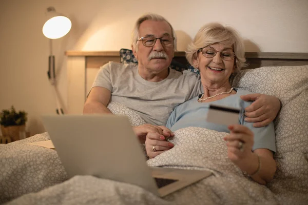 Happy Mature Couple Using Credit Card While Shopping Online Laptop — Photo