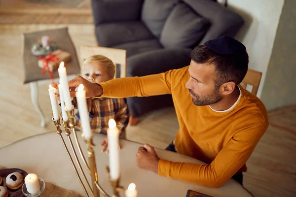 Mid Adult Father His Small Son Lighting Candles Menorah While — Stockfoto