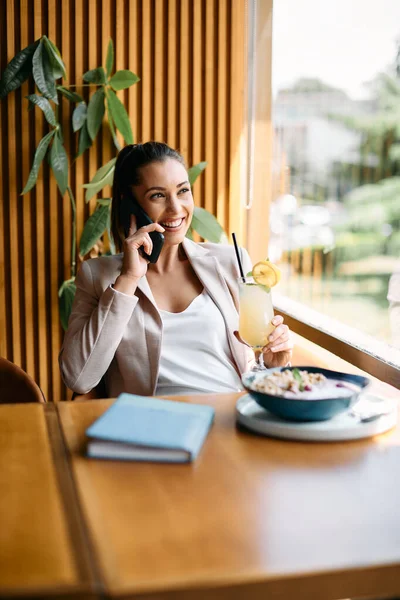 Happy Businesswoman Talking Mobile Phone While Drinking Lemonade Cafe — 图库照片