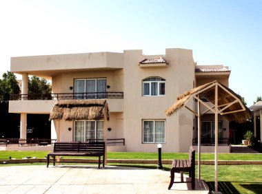 two-storey villa with adjacent gazans