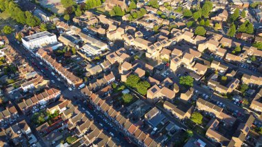Aerial footage by drone high angle view of London Luton City of England with Buildings