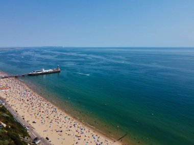 High Angle Sea View Beach Front with People at Bournemouth City of England UK, Aerial Footage of British Ocean