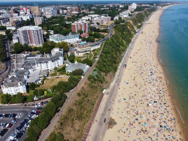 High Angle Sea View Beach Front with People at Bournemouth City of England UK, Aerial Footage of British Ocean