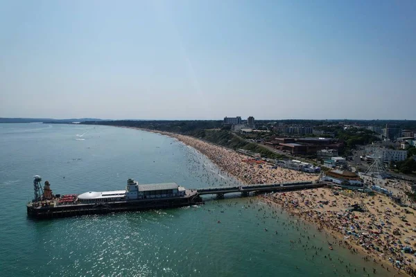 High Angle Sea View Beach Front with People at Bournemouth City of England UK, Aerial Footage of British Ocean