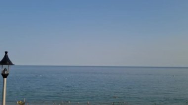 Beautiful View of Beach with full of people and birds from top of the hill of Bournemouth City
