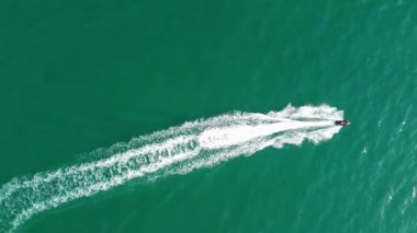 Aerial view of Fast, Racing and Sports Boats in the Ocean, High Angle footage of Beach of Bournemouth City of England UK