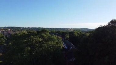 Aerial footage by drone high angle view of London Luton City of England with Buildings
