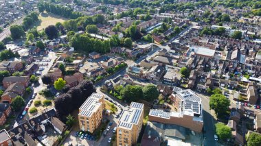 Aerial footage high angle view of Luton Town of England and Railways Station and Train on Tracks