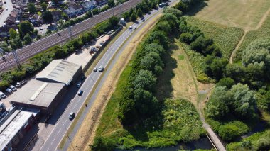 Aerial footage by drone high angle view of London Luton City of England with Buildings