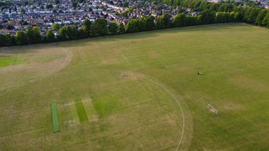 Aerial footage by drone high angle view of London Luton City of England with Buildings