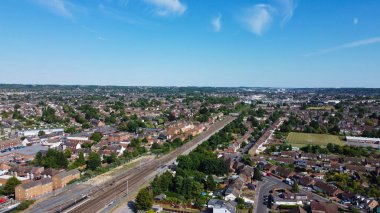 High angle footage of Central Luton City and residential buildings and houses of England, aerial view from Local Railway Station.