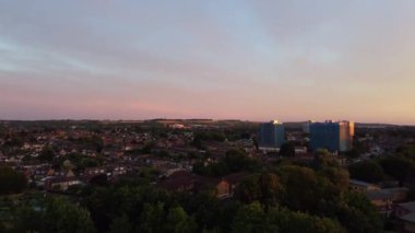 High Angle Aerial Footage View of Train and Railway Tracks at Sunset Time over Luton Town of England UK
