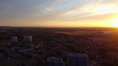 High Angle Aerial Footage View of Train and Railway Tracks at Sunset Time over Luton Town of England UK