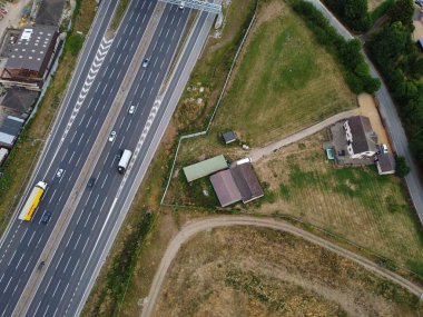 Aerial View and High Angle Footage of British Motorways Interchange of M1 Junction 11a at North Luton City of England UK.