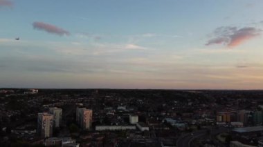 Gorgeous Aerial View of Luton City of England UK at Sunset Time, Colourful Clouds high angle footage taken by drone