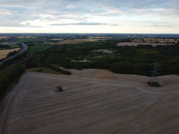 stock image High Angle Aerial view of British Motorways and Train Tracks at North London Luton England UK