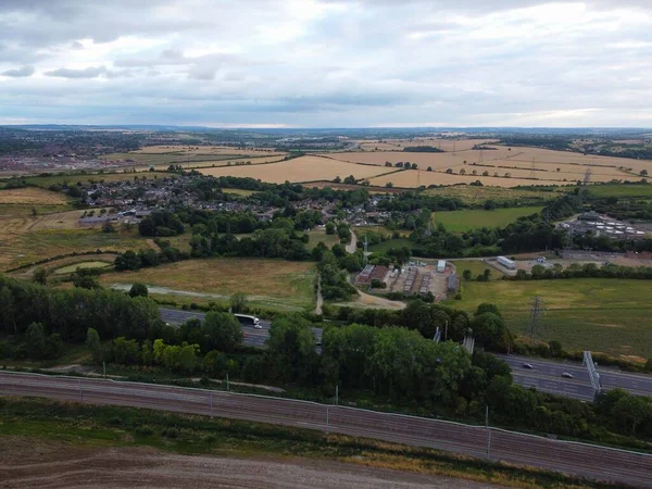 High Angle Drone's Camera high angle View of railway Tracks at Motorways Junction of Luton England UK