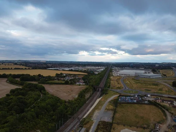 High Angle Drone's Camera high angle View of railway Tracks at Motorways Junction of Luton England UK