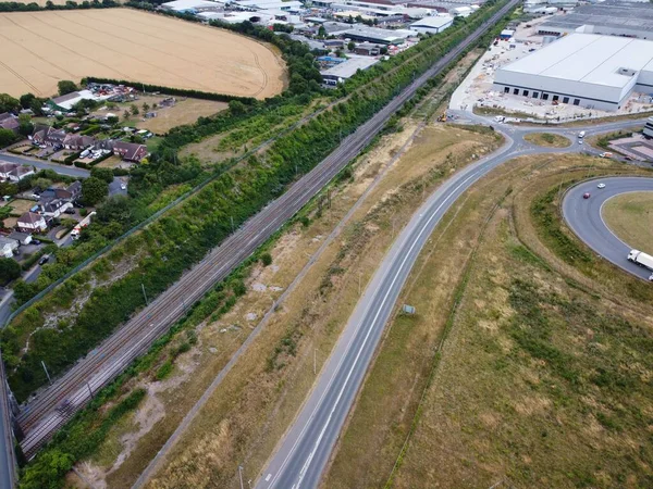 High Angle Drone\'s Camera high angle View of railway Tracks at Motorways Junction of Luton England UK