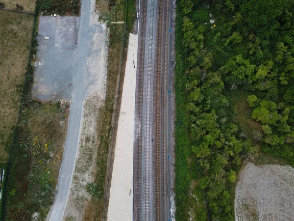 High Angle Drone\'s Camera high angle View of railway Tracks at Motorways Junction of Luton England UK