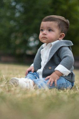 11 aylık Şirin Bebek, İngiltere 'nin Luton Park' ındaki kameraya poz veriyor.