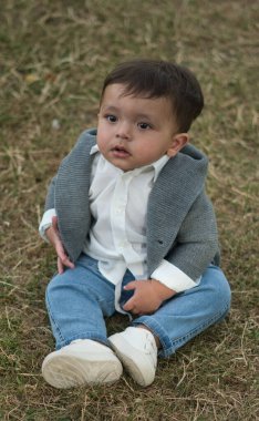 11 aylık Şirin Bebek, İngiltere 'nin Luton Park' ındaki kameraya poz veriyor.