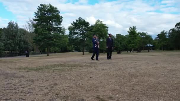 Young Asian Males Walking Infant Baby Boy Local Public Park — Video Stock