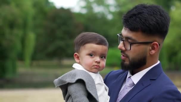 Asian Pakistani Father Holding His Months Old Infant Local Park — Αρχείο Βίντεο