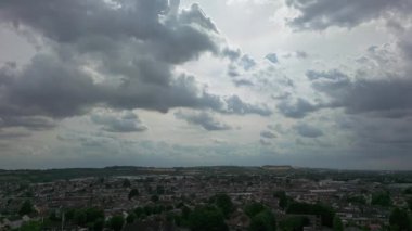 Beautiful High Angle Altitude View of Clouds and British Town of England UK, Air plane view at 360 degree.