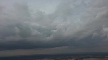 Beautiful High Angle Altitude View of Clouds and British Town of England UK, Air plane view at 360 degree.
