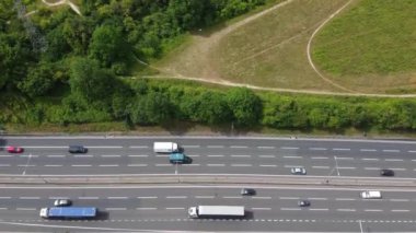 High Angle aerial view of British Roads and Traffic Passing through Luton City and countryside of England UK
