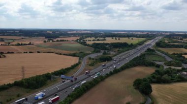 High Angle aerial view of British Roads and Traffic Passing through Luton City and countryside of England UK