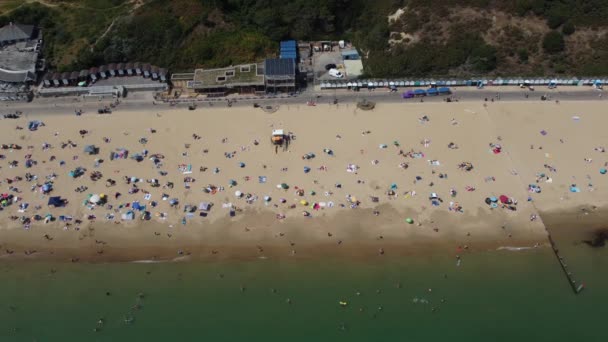 Aerial Footage People Relaxing Swimming Ocean Water Beach Bournemouth England — Video