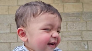 Cute Asian Pakistani Baby Boy is Playing and Posing