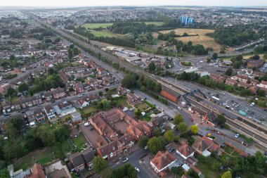 High Angle Drone's View of Luton City Center and Railway Station, Luton England. Luton is town and borough with unitary authority status, in the ceremonial county of Bedfordshire; 