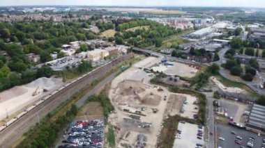 Aerial footage and high angle Train on Tracks at Central Luton Railway Station and City Centre of Luton Town of England UK