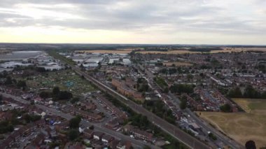 Train moving on Tracks at Sunset Time, the footage was captured at Leagrave Luton Station of England at a Beautiful Sunset Time, Trains is Passing from British City
