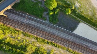 High Angle Drone's Camera View of Railway Tracks at Luton England UK, This Footage was Captured at the Junction 11a of M1 Motorways at Sunset Time, Luton England UK