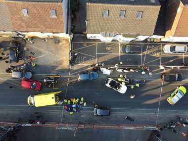 Car Accident Drone's Footage, Leagrave road which was closed due to accident, i flew the drone and saw many police, fire and ambulance vehicles, the white audi car was cut into pieces, ripped off the roof and doors to take out passenger from car.