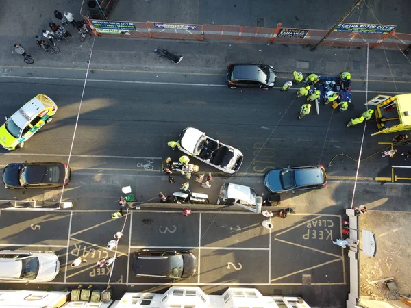 Car Accident Drone's Footage, Leagrave road which was closed due to accident, i flew the drone and saw many police, fire and ambulance vehicles, the white audi car was cut into pieces, ripped off the roof and doors to take out passenger from car.