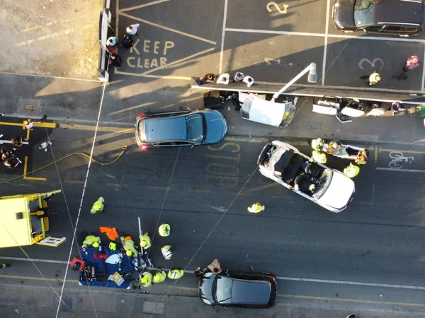 Car Accident Drone's Footage, Leagrave road which was closed due to accident, i flew the drone and saw many police, fire and ambulance vehicles, the white audi car was cut into pieces, ripped off the roof and doors to take out passenger from car.
