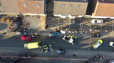 Car Accident Drone's Footage. Leagrave road which was closed due to accident, i flew the drone and saw many police, fire and ambulance vehicles, the white audi car was cut into pieces, ripped off the roof and doors to take out passenger from car. 