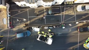 Car Accident Drone's Footage. Leagrave road which was closed due to accident, i flew the drone and saw many police, fire and ambulance vehicles, the white audi car was cut into pieces, ripped off the roof and doors to take out passenger from car. 