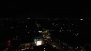 Night Aerial Footage of Luton City of England.  Drone's Night Flight over Luton Town of England. it was Asian wedding when they were enjoying the party and live fireworks, (high angle view with drone's camera)
