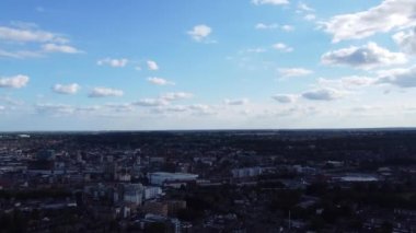 Aerial view of British Town Centre of Luton England with Railway Station and Train on Track