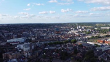 Aerial view of British Town Centre of Luton England with Railway Station and Train on Track