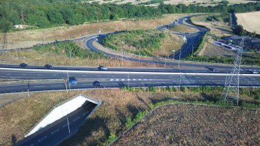 High Angle View of Luton Airport Junction Interchange of Motorways M1 J10 at Luton City of England UK. it is Connection Luton City and London Luton Airport Image Created on 11th August 2022 with Drone