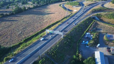 High Angle View of Luton Airport Junction Interchange of Motorways M1 J10 at Luton City of England UK. it is Connection Luton City and London Luton Airport Image Created on 11th August 2022 with Drone