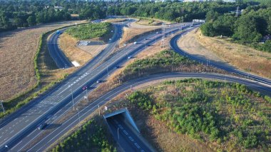High Angle View of Luton Airport Junction Interchange of Motorways M1 J10 at Luton City of England UK. it is Connection Luton City and London Luton Airport Image Created on 11th August 2022 with Drone