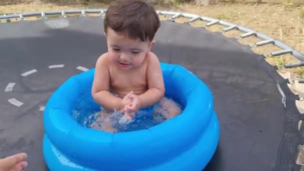 One Year Old Asian Baby Boy Enjoying Water Tub — Stock Video